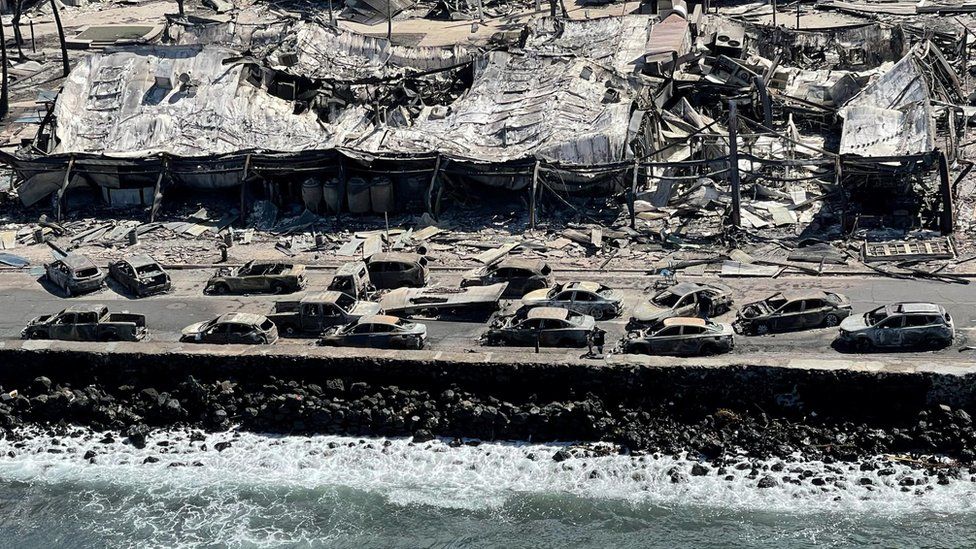 Burnt-out buildings and cars on Front Street after a wildfire ripped through Lahaina