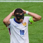 Mbappe Struggles with Mask, France’s Luck Holds